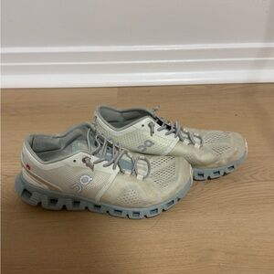 On Running Cream and Gray Athletic Shoes